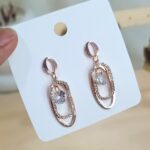 Stone-Studded Oval Dangler Earrings