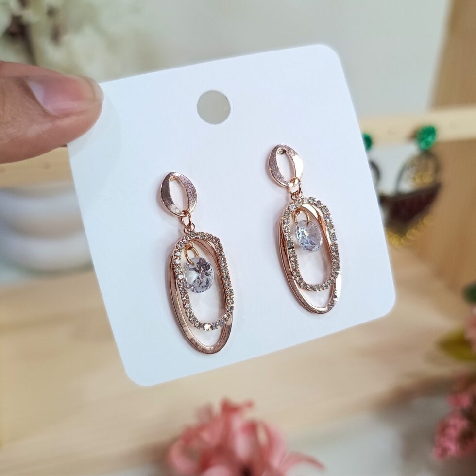 Stone-Studded Oval Dangler Earrings-blingytrends.com